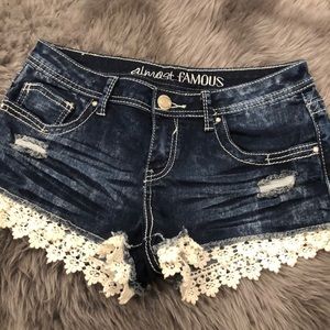 Lace trimmed jean shorts